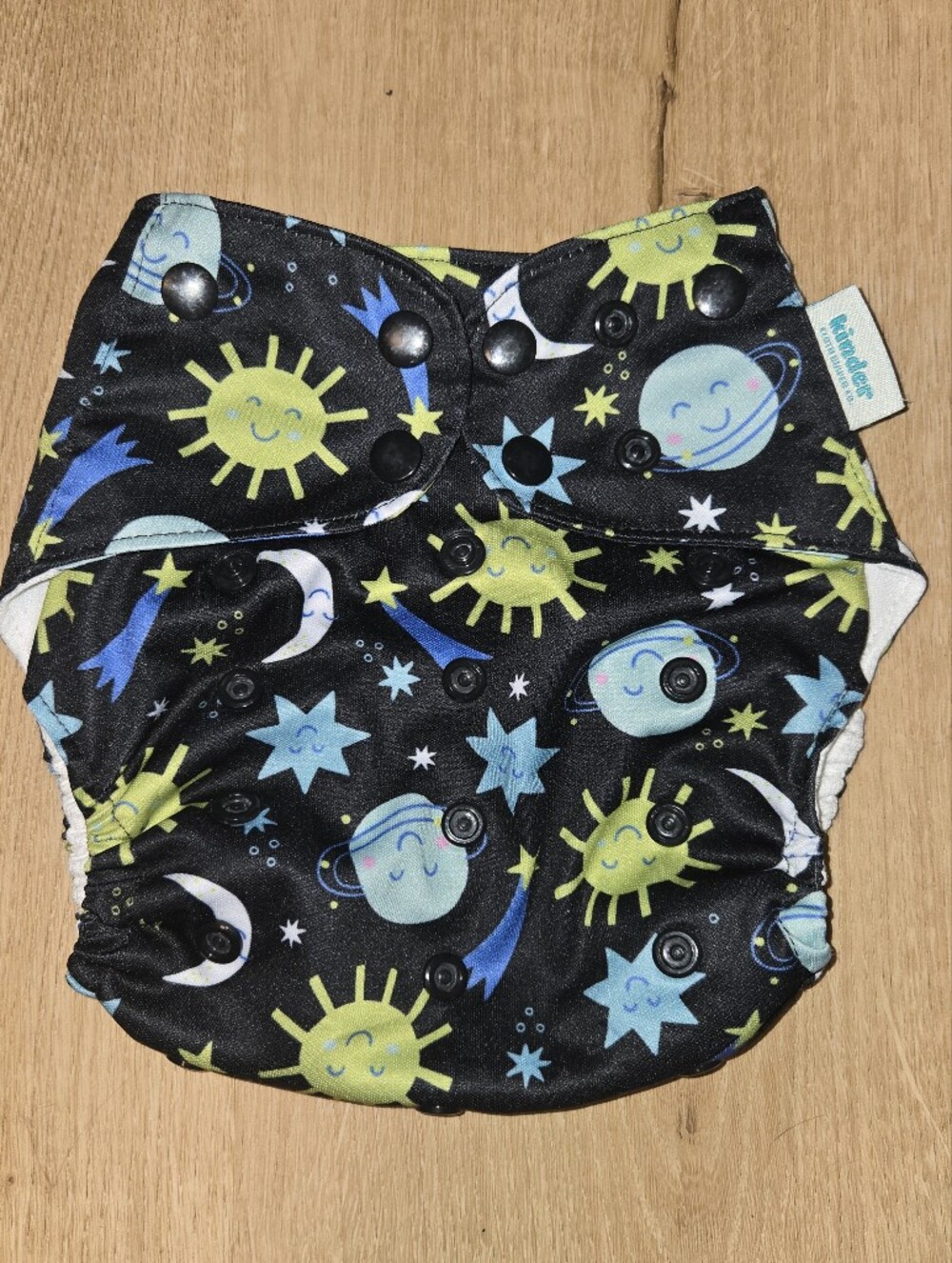 Kinder one size pocket cloth diaper planet print